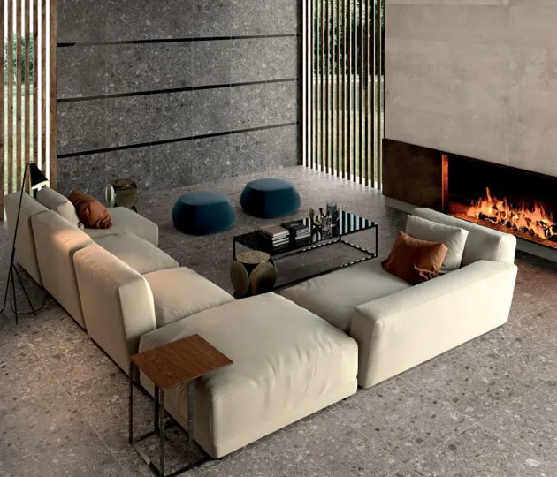 Salotto moderno con pavimenti in gres porcellanato effetto Ceppo di Gré Futura di Ariana